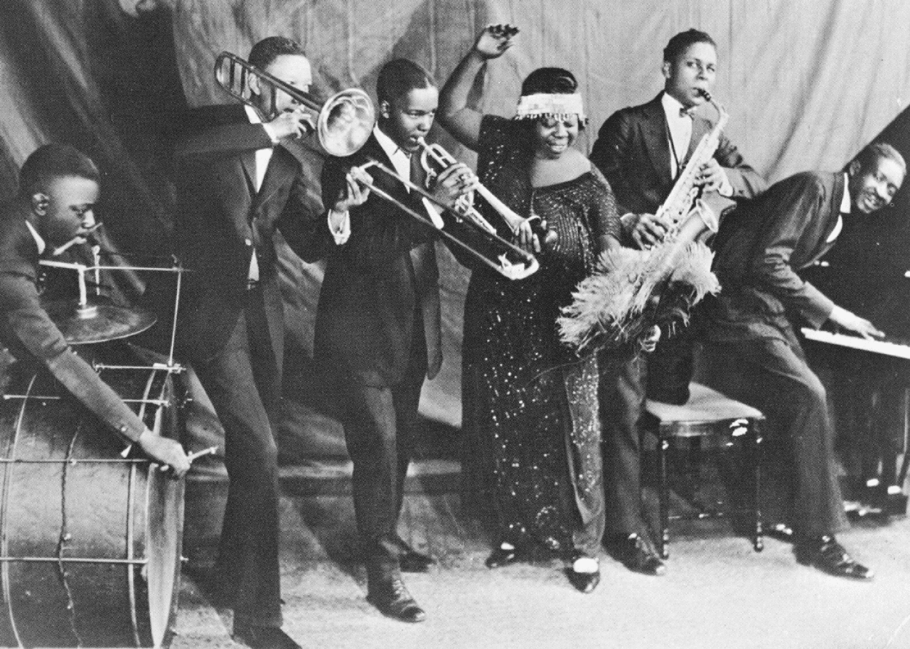 Ma Rainey and her band pose for a portrait.