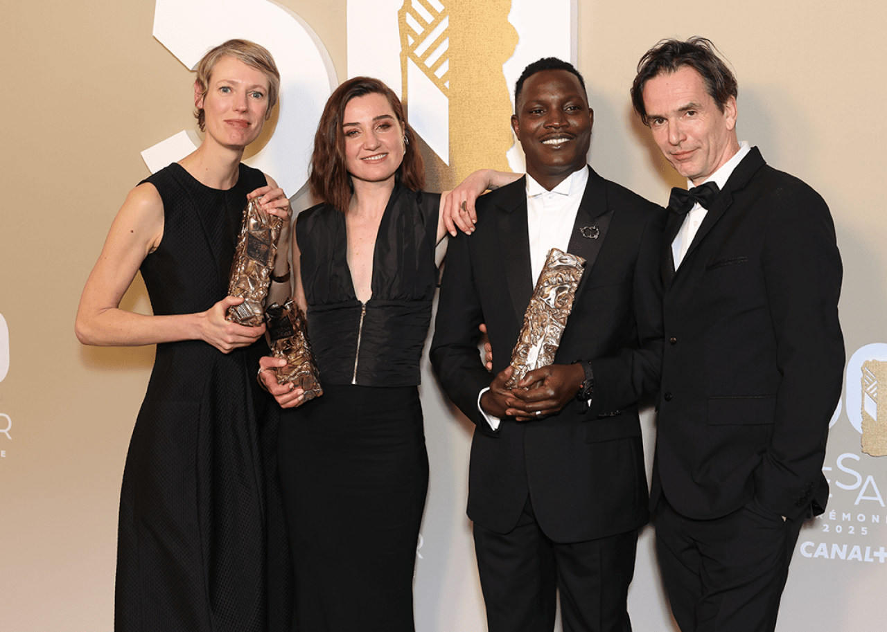 #16. Souleymane's Story Delphine Agut, Nina Meurisse, Abou Sangare and Boris Lojkine pose in the winners room with their Awards for the movie