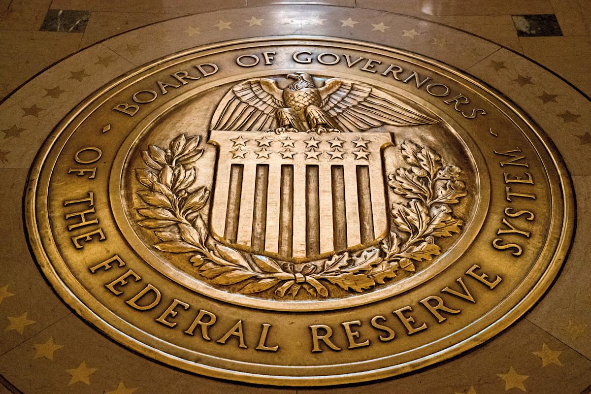 The Fed faces economic uncertainty and political pressure as it decides whether to cut rates