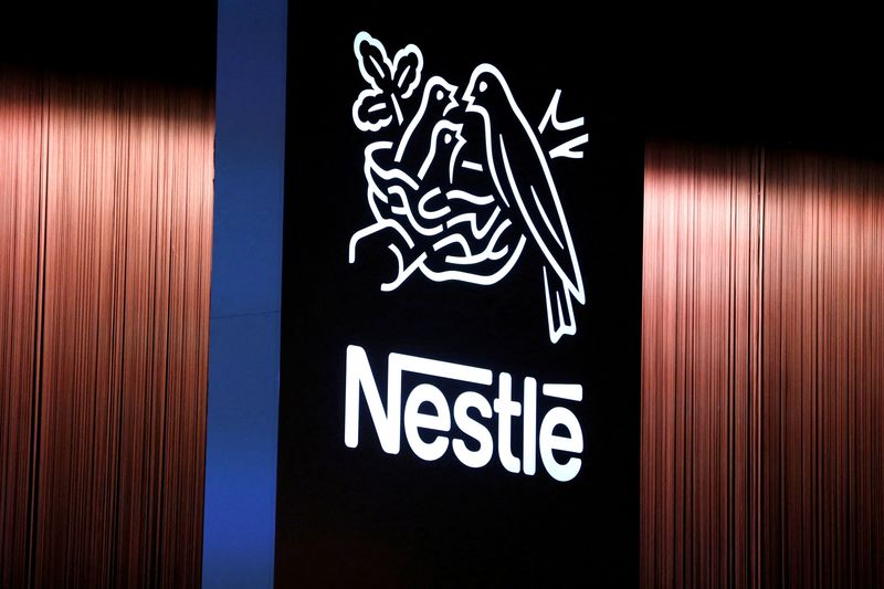 Nestle shares indicated slightly higher after chairman’s early departure