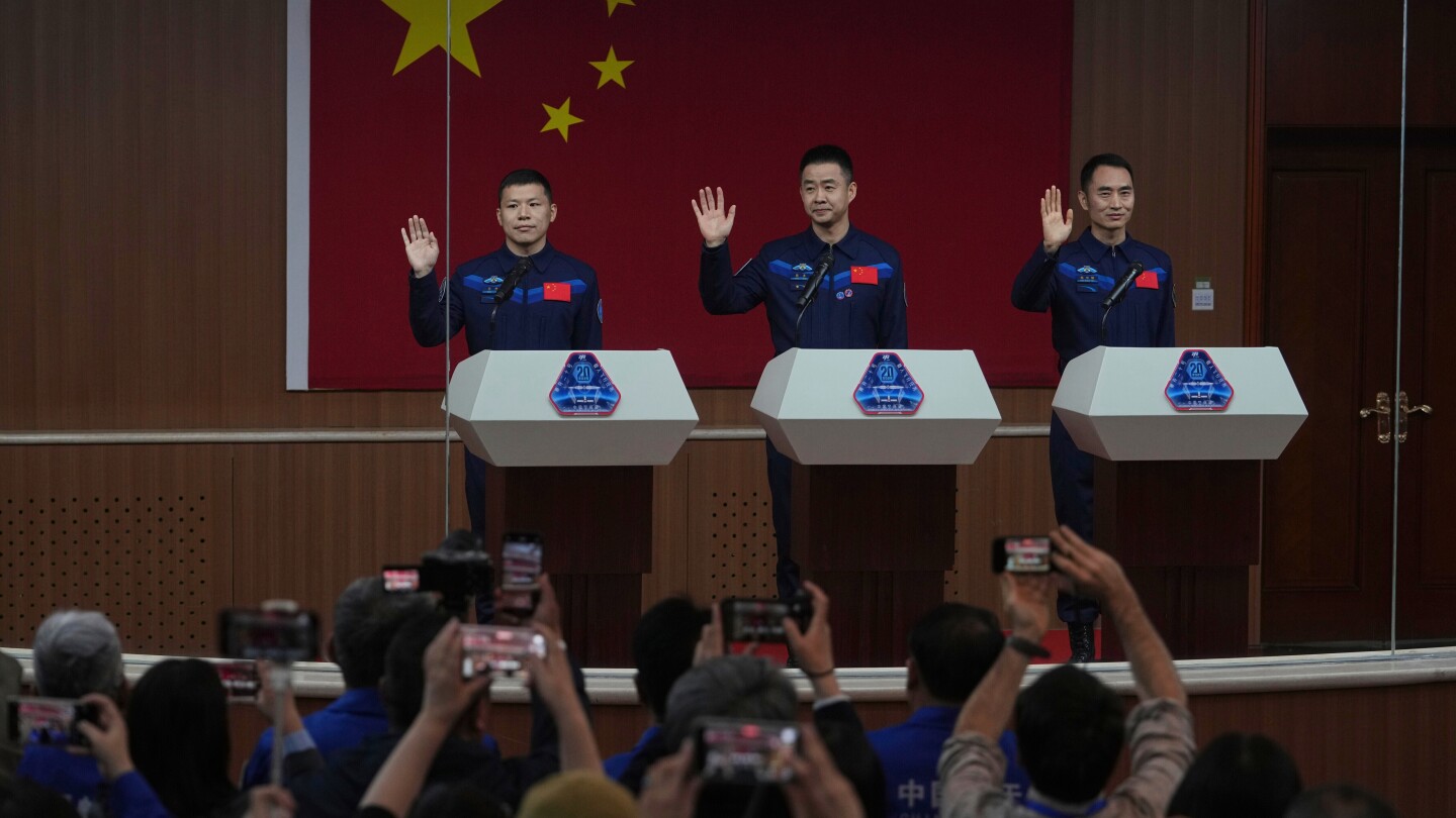 China’s stranded astronauts return from space station