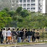 Fraudsters flee Cambodia’s ‘scam city’ after accused boss taken down | National